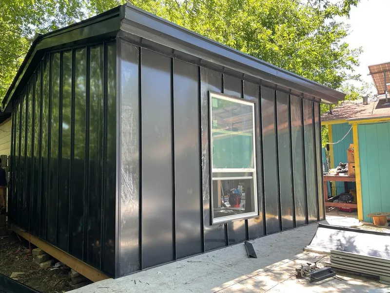 Black standing seam metal wall panels for Metal Roof Installation in Gardere