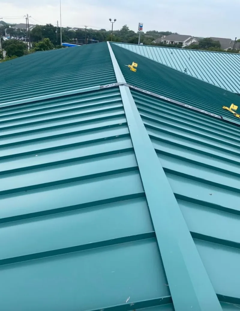 Green commercial metal roof ridge and valley for Metal Roof Repair in Gardere